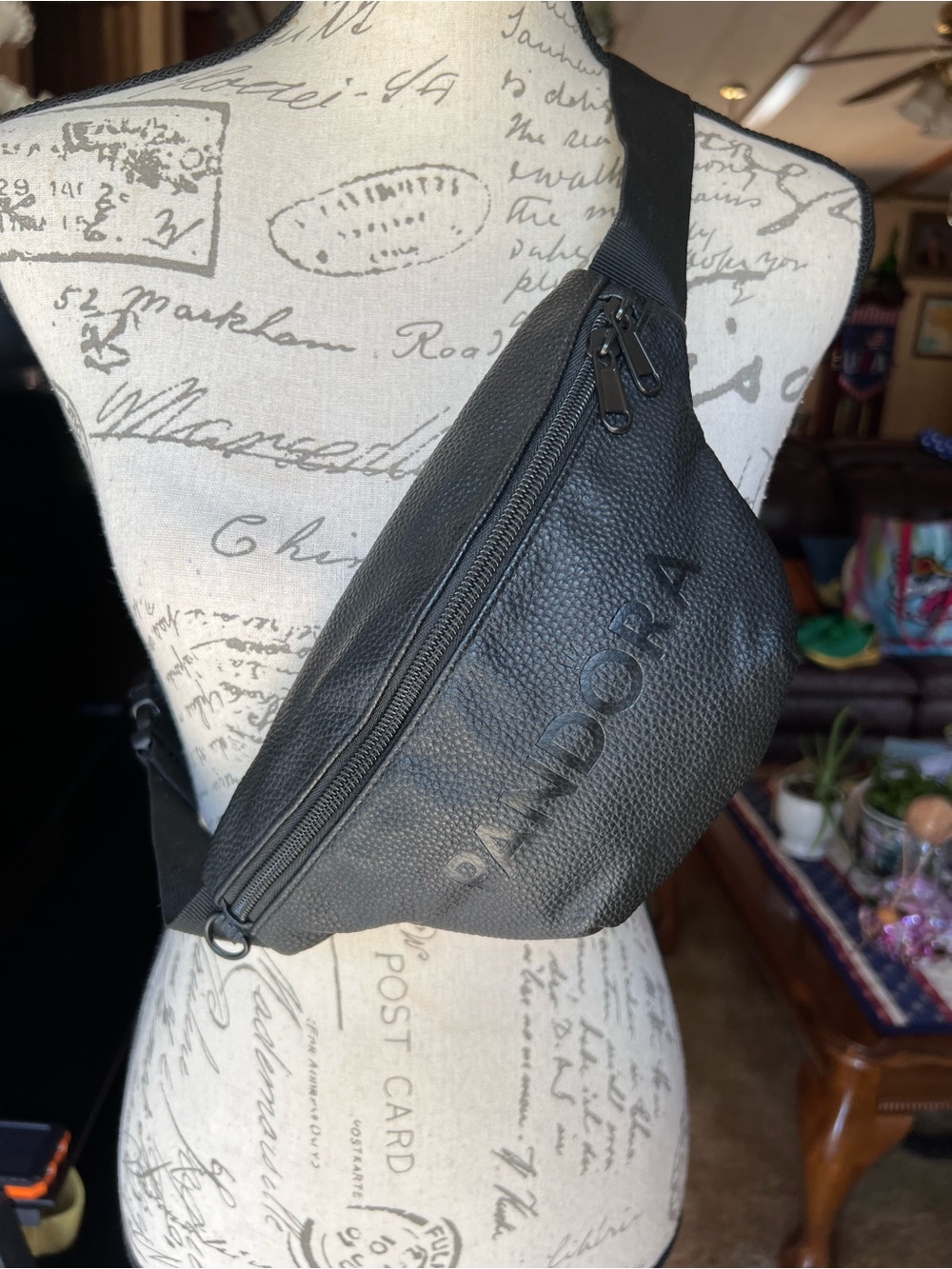 Pandora black faux leather belt bag.